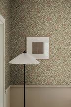 Linnea wallpaper by Sandberg in Burgundy, styled on an interior wall