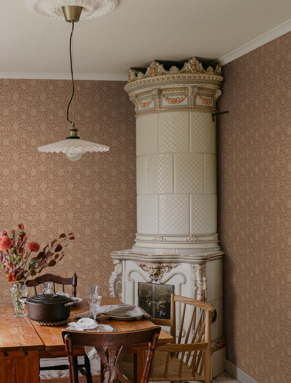 Anton wallpaper by Sandberg in Terracotta, styled on an interior wall