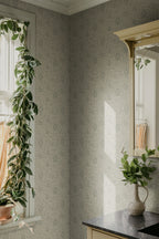 Anton wallpaper by Sandberg in Sage Green, styled on an interior wall