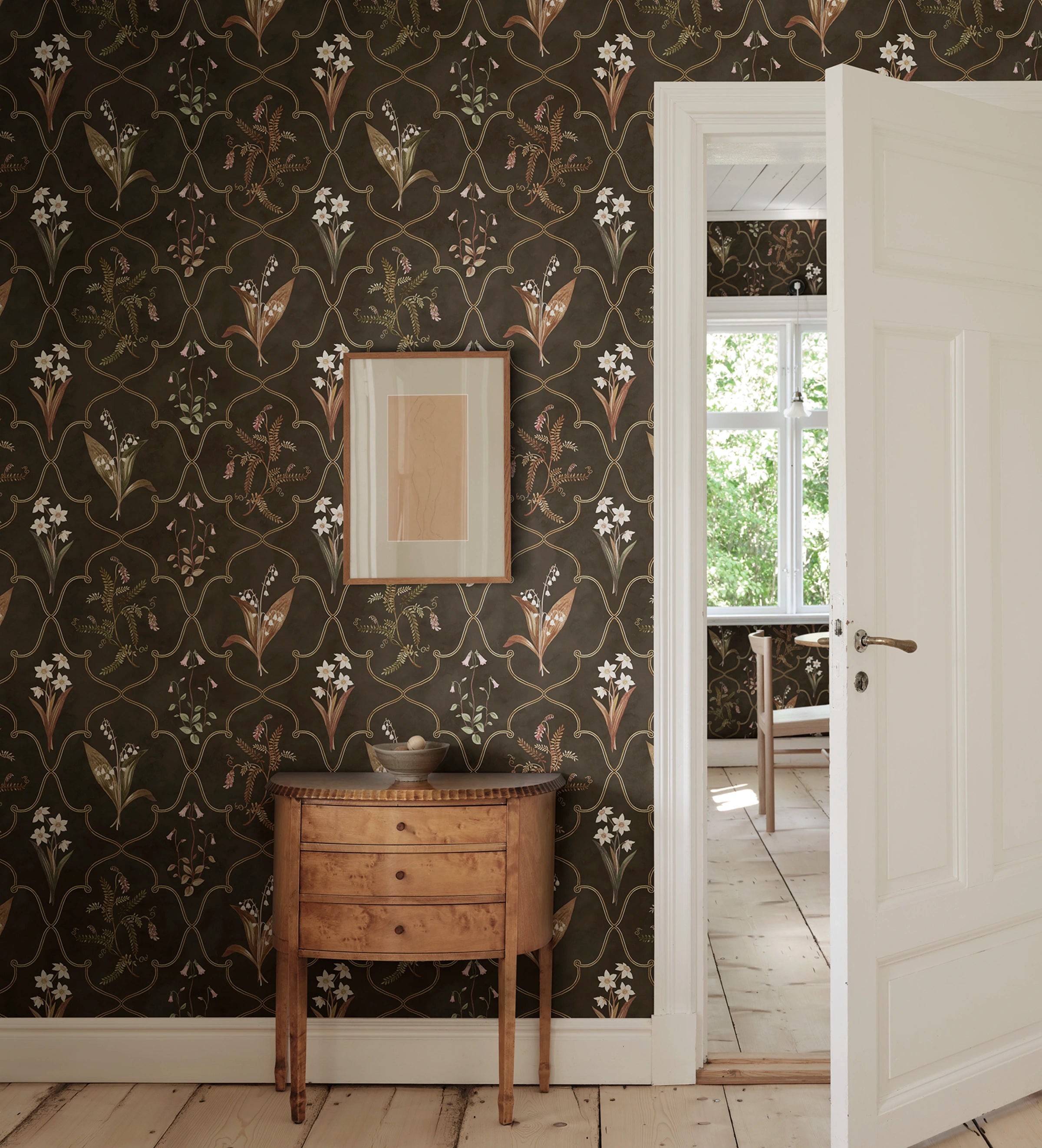 Louise wallpaper by Sandberg – botanical design, Dark, styled on an interior wall