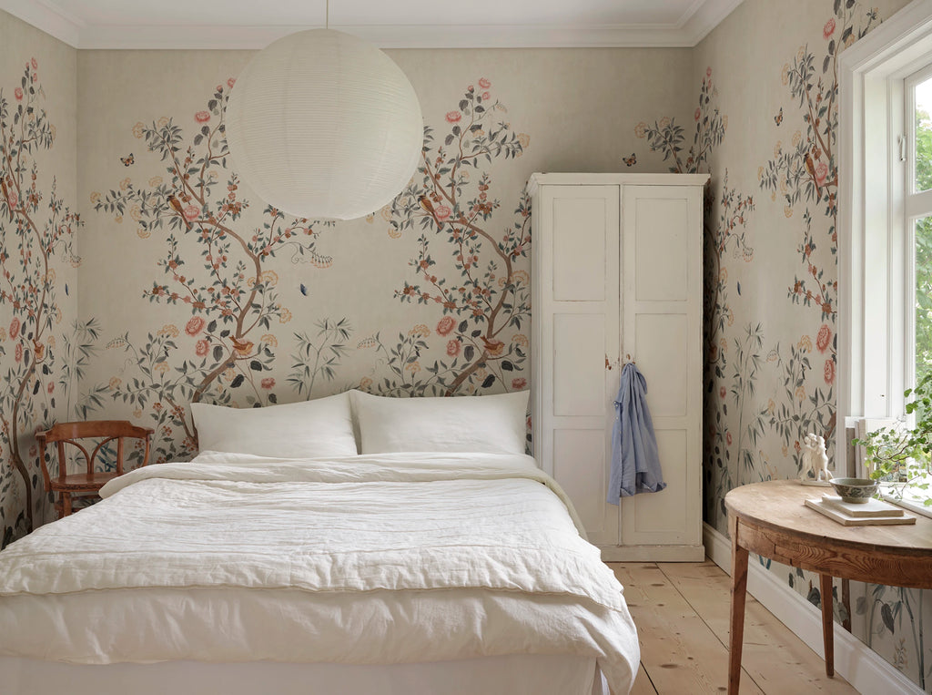 Eleonora wallpaper by Sandberg – floral design, Misty Blue, styled on an interior wall