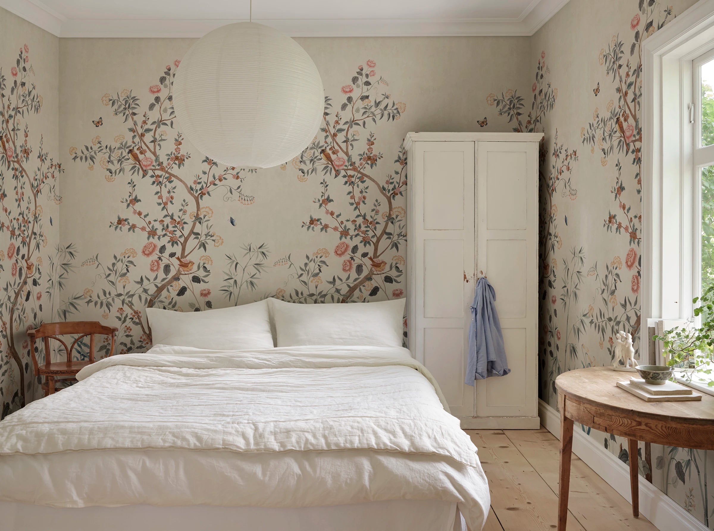 Eleonora wallpaper by Sandberg – floral design, Misty Blue, styled on an interior wall