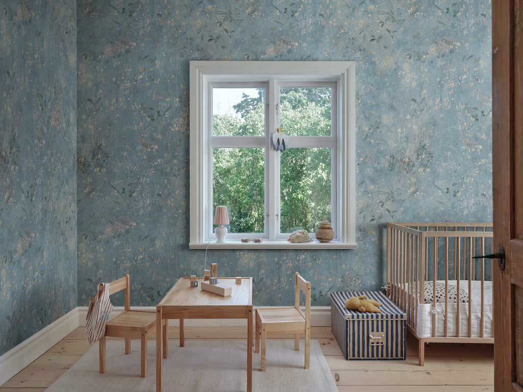 Juni wallpaper by Sandberg – floral design, Light Blue, styled on an interior wall