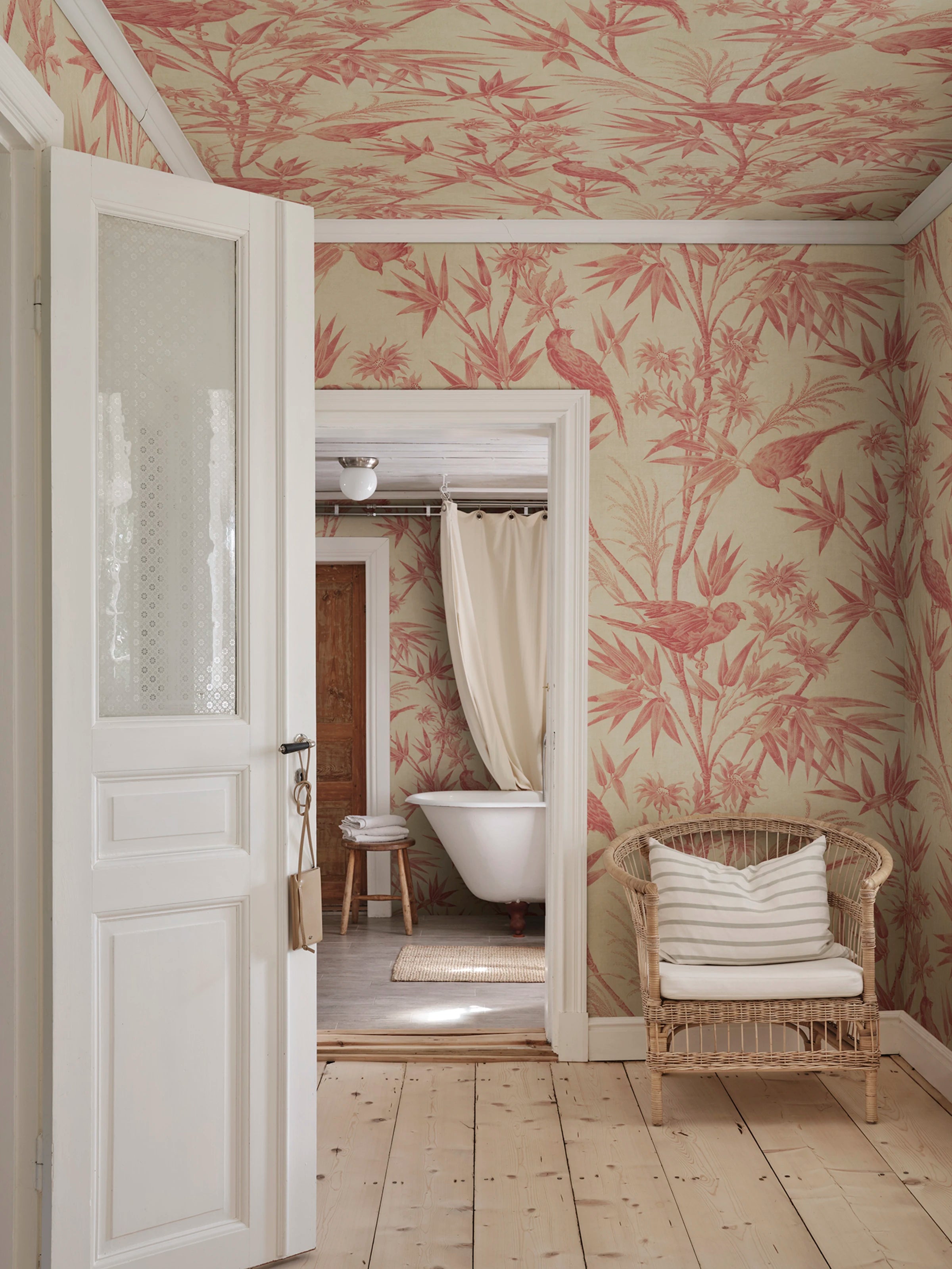 Celeste Mural wall mural by Sandberg – botanical design, Red, styled on an interior wall