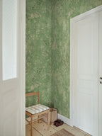 Juni wallpaper by Sandberg – floral design, Green, styled on an interior wall