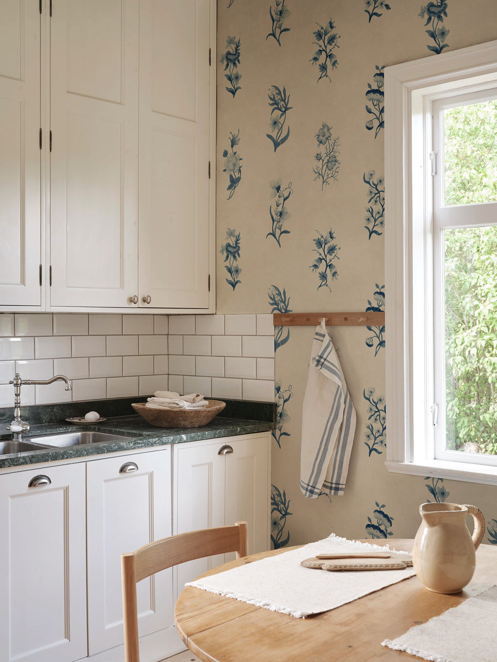 Victoria wallpaper by Sandberg – floral design, Blue, styled on an interior wall