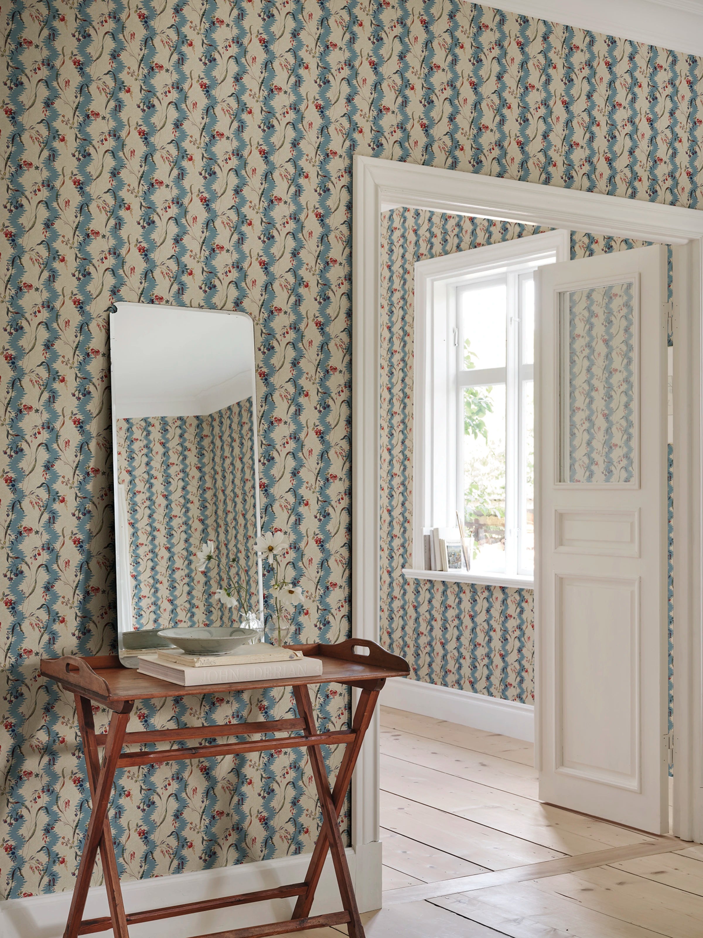 Beatrice wallpaper by Sandberg – floral design, Blue, styled on an interior wall