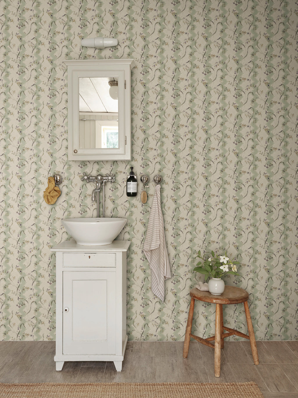 Beatrice wallpaper by Sandberg – floral design, Light Green, styled on an interior wall