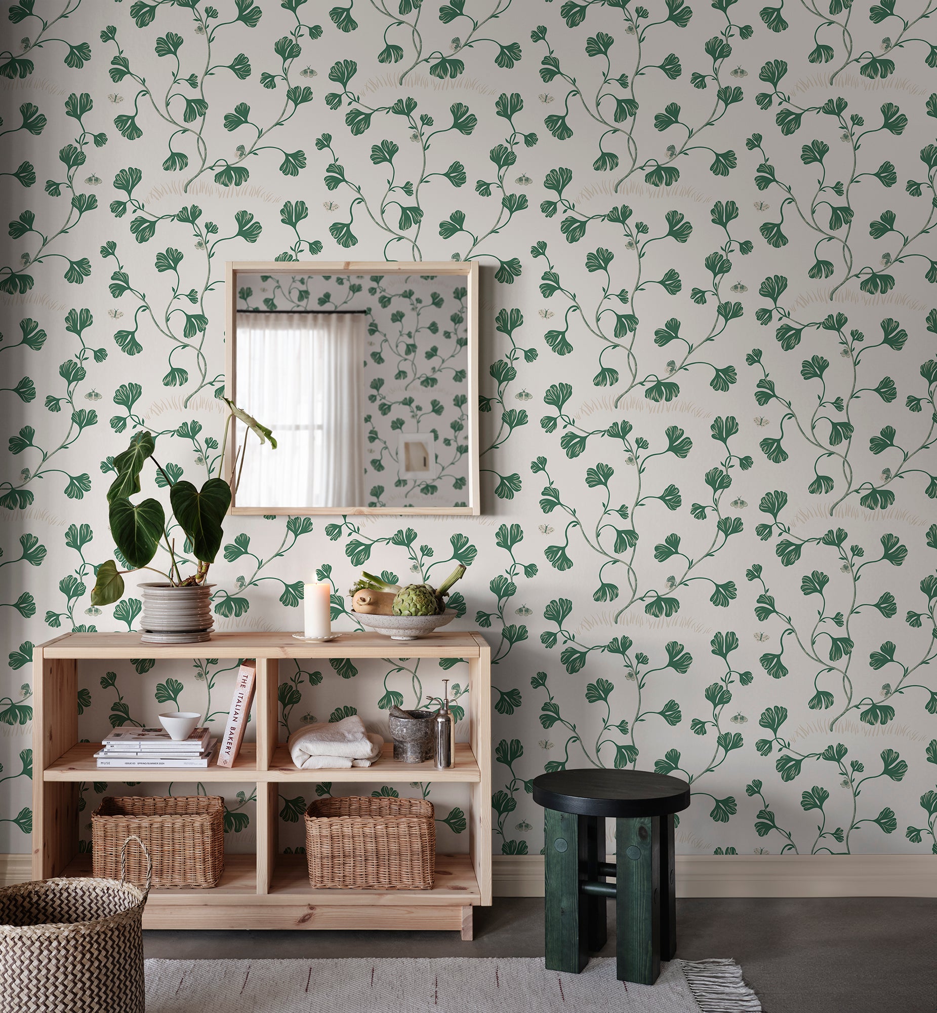 Ebba wallpaper by Sandberg in Green, styled on an interior wall
