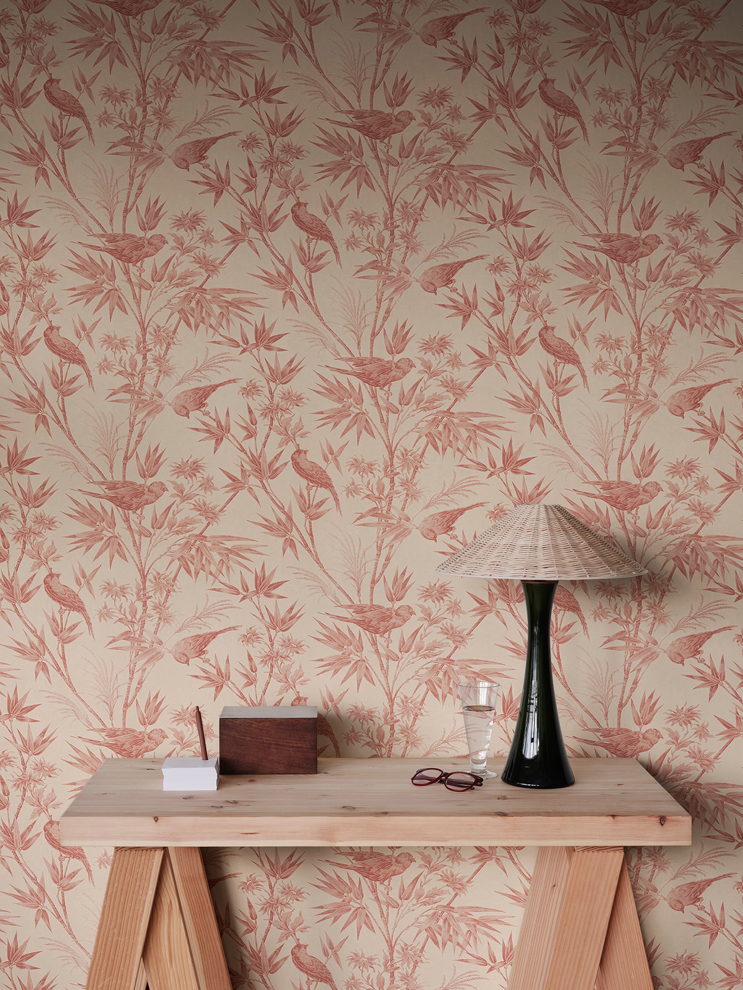 Celeste wallpaper by Sandberg in Red, styled on an interior wall