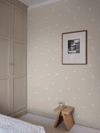 Frida wallpaper by Sandberg in Sandstone, styled on an interior wall
