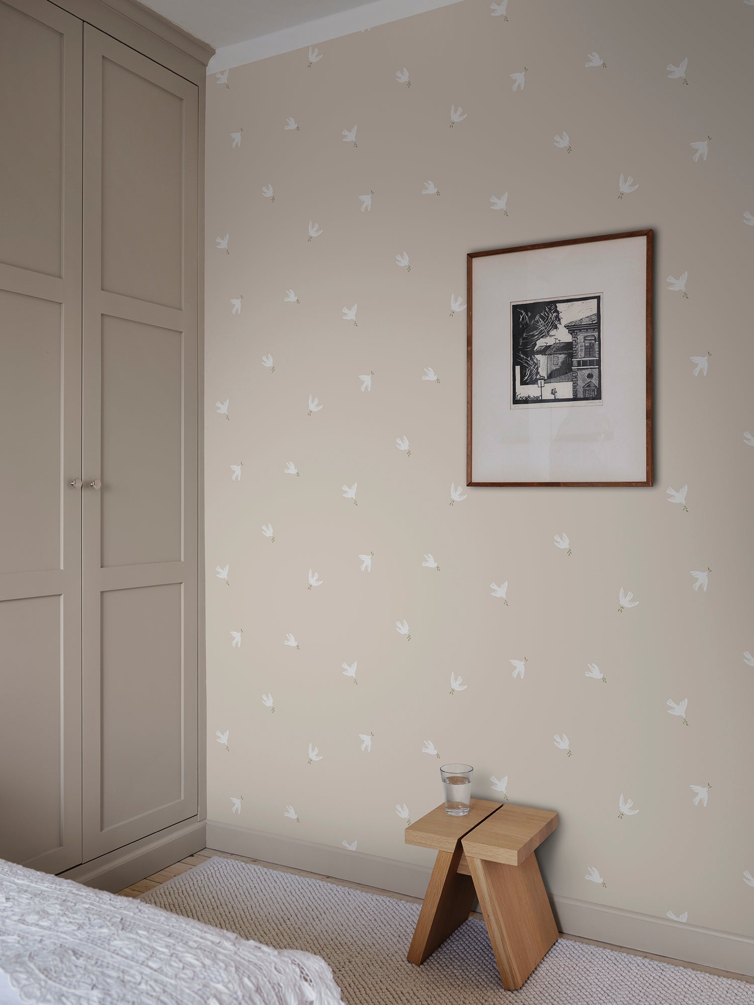 Frida wallpaper by Sandberg in Sandstone, styled on an interior wall