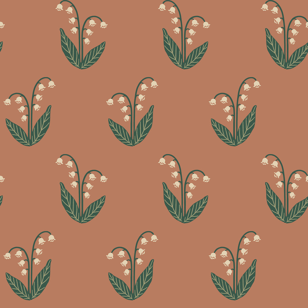 Lilly wallpaper by Sandberg in terracotta, cream lily-of-the-valley sprigs with dark green leaves, flat roll swatch