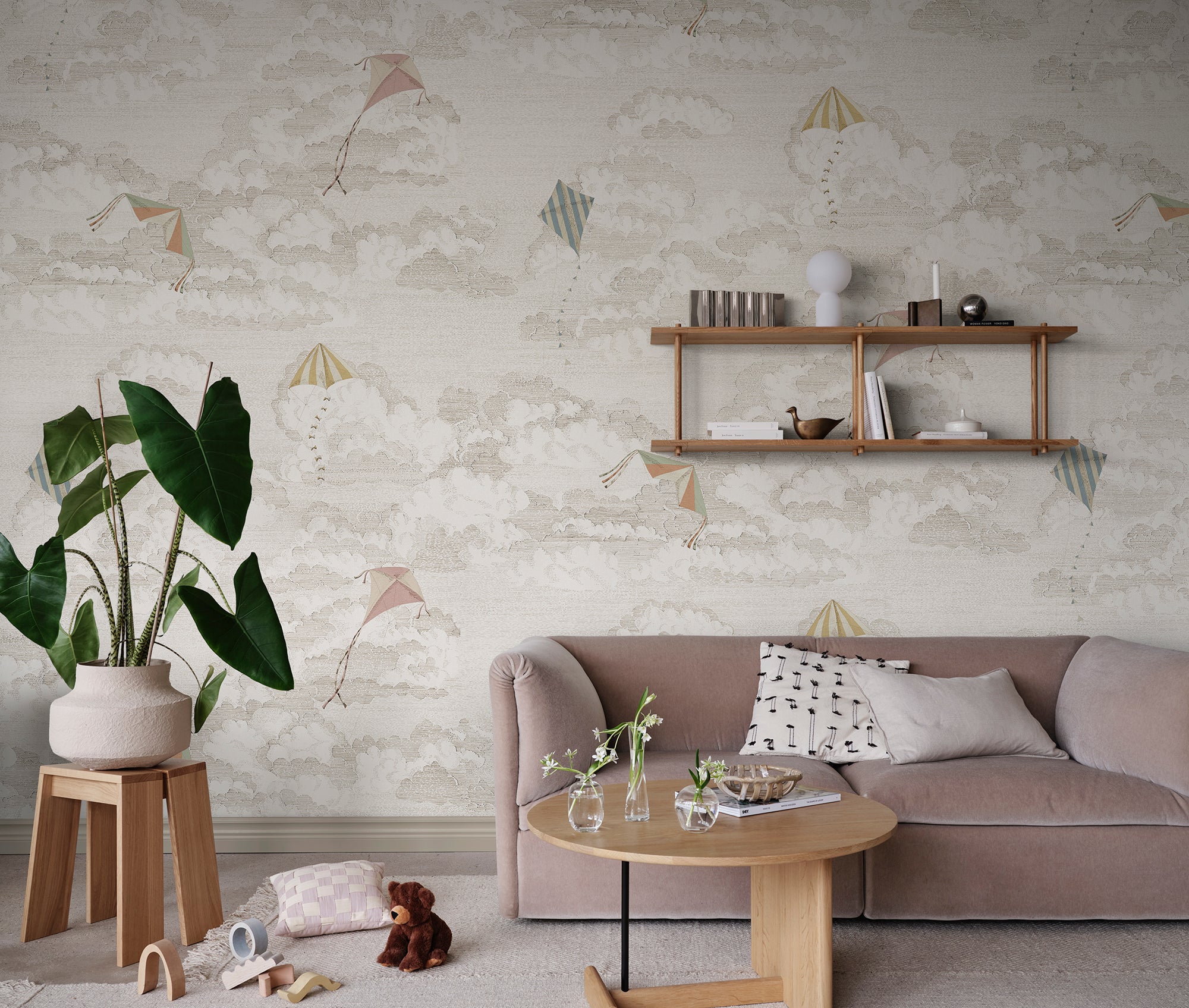Bonnie & Kites wall mural by Sandberg in cream styled in a living room with pink sofa and shelf