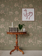 Adele wallpaper by Sandberg in Green, styled on an interior wall