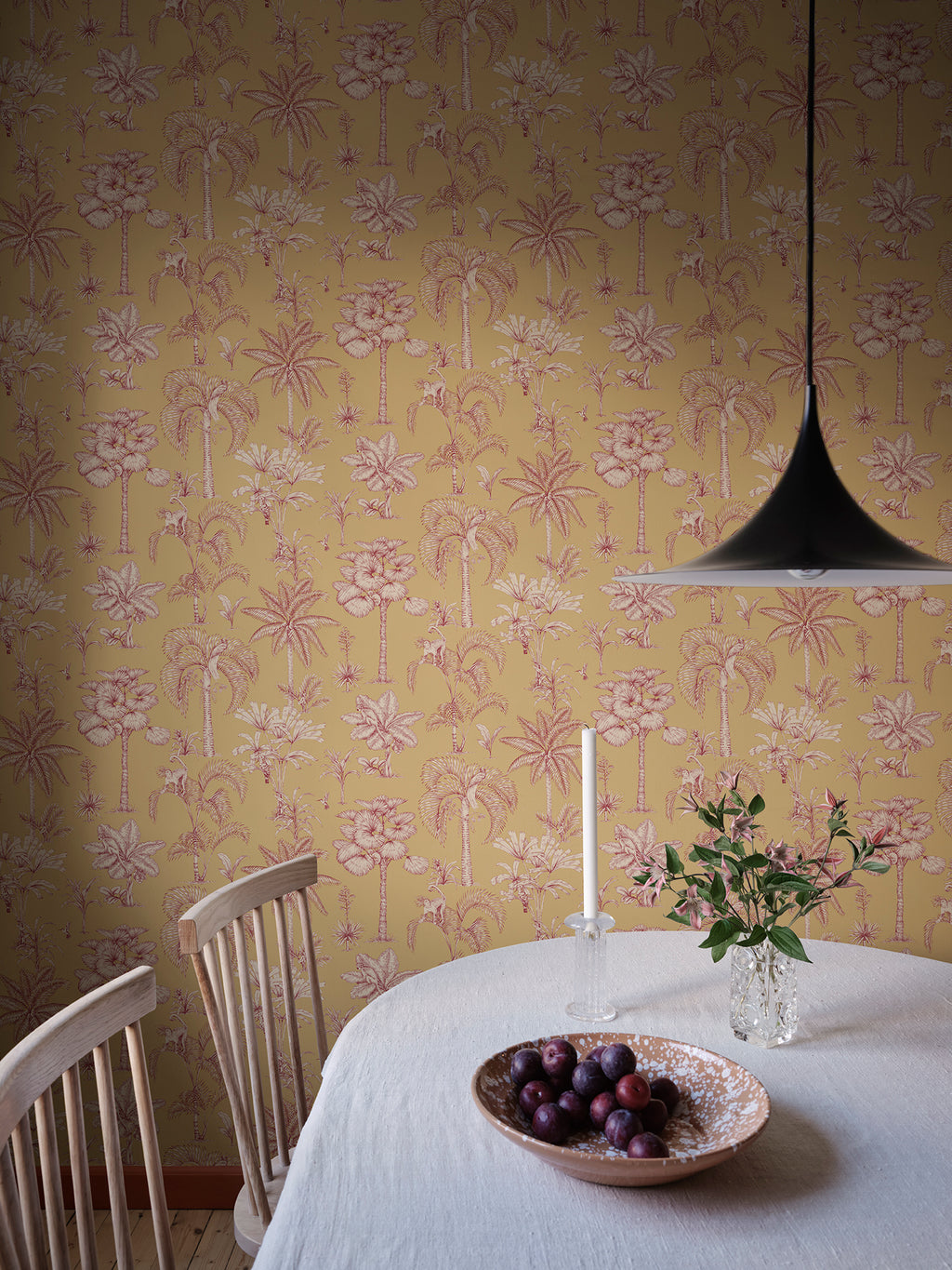 Adele wallpaper by Sandberg in Yellow, styled on an interior wall