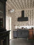 Carla wallpaper by Sandberg in Garden Green, styled on an interior wall
