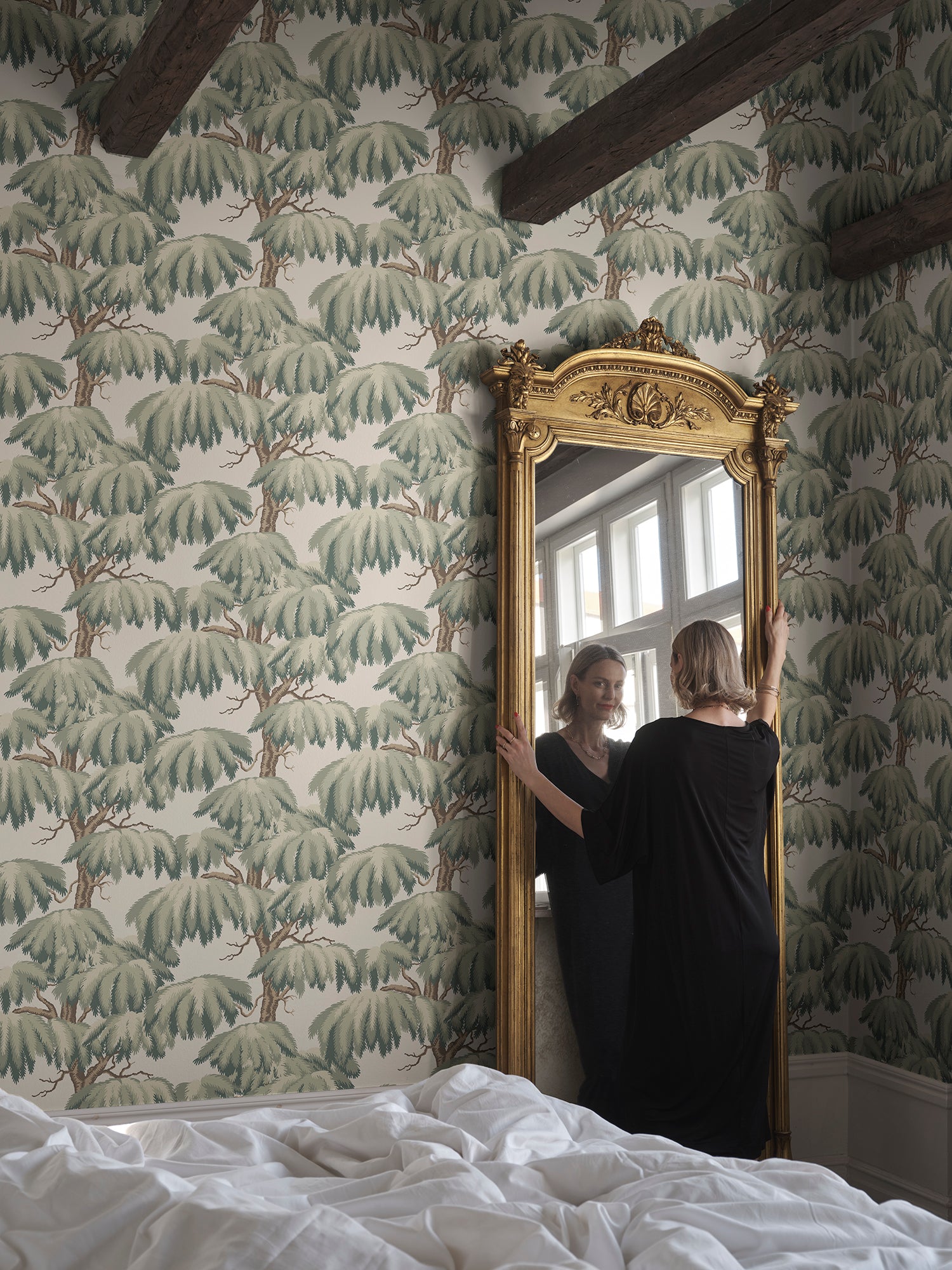 Alba wallpaper by Sandberg in Green, styled on an interior wall