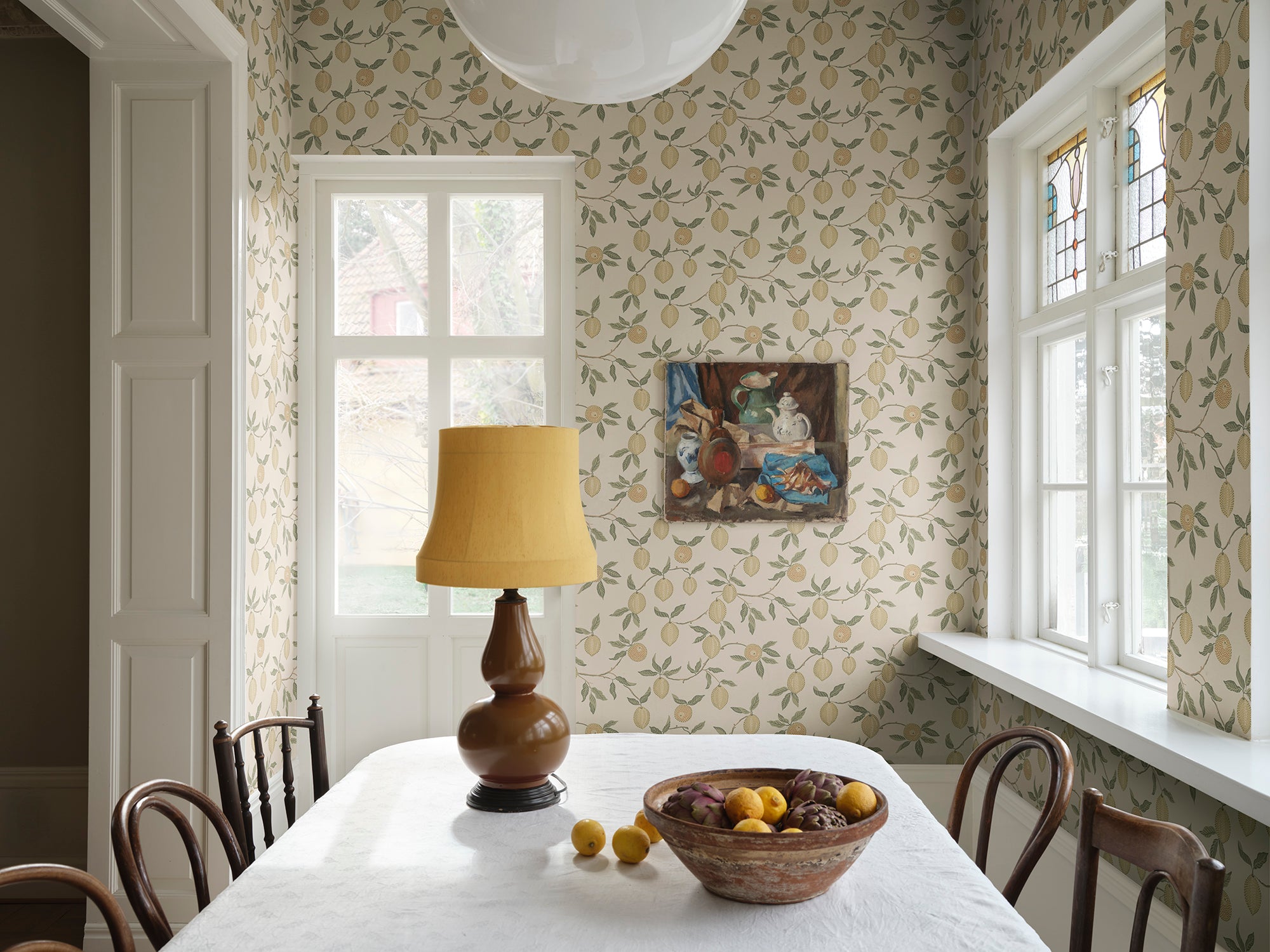 Limone wallpaper by Sandberg in Yellow, styled on an interior wall