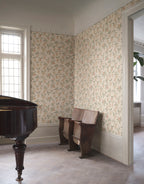 Limone lemon wallpaper by Sandberg in pale cream wrapping a corner, antique grand piano and timber theatre seats on herringbone floor