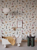 Taiga Dogs & Friends wall mural by Sandberg in white styled in a nursery with a balloon light, cot and side table