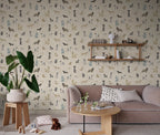 Taiga Dogs & Friends wall mural by Sandberg in sand beige styled in a living room with a pink sofa and wall shelf