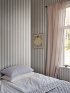 Henrik wallpaper by Sandberg in Light Blue, styled on an interior wall