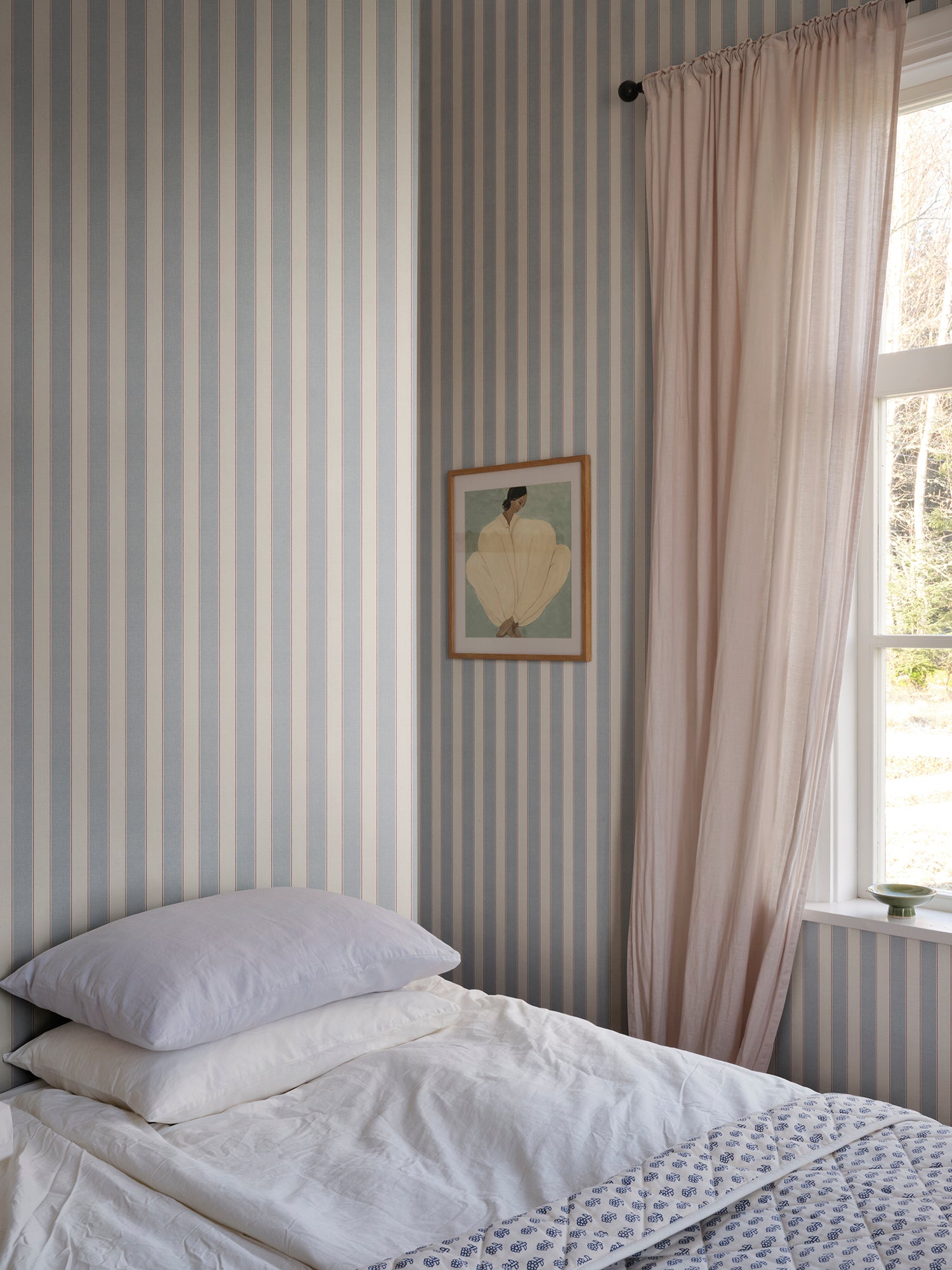 Henrik wallpaper by Sandberg in Light Blue, styled on an interior wall