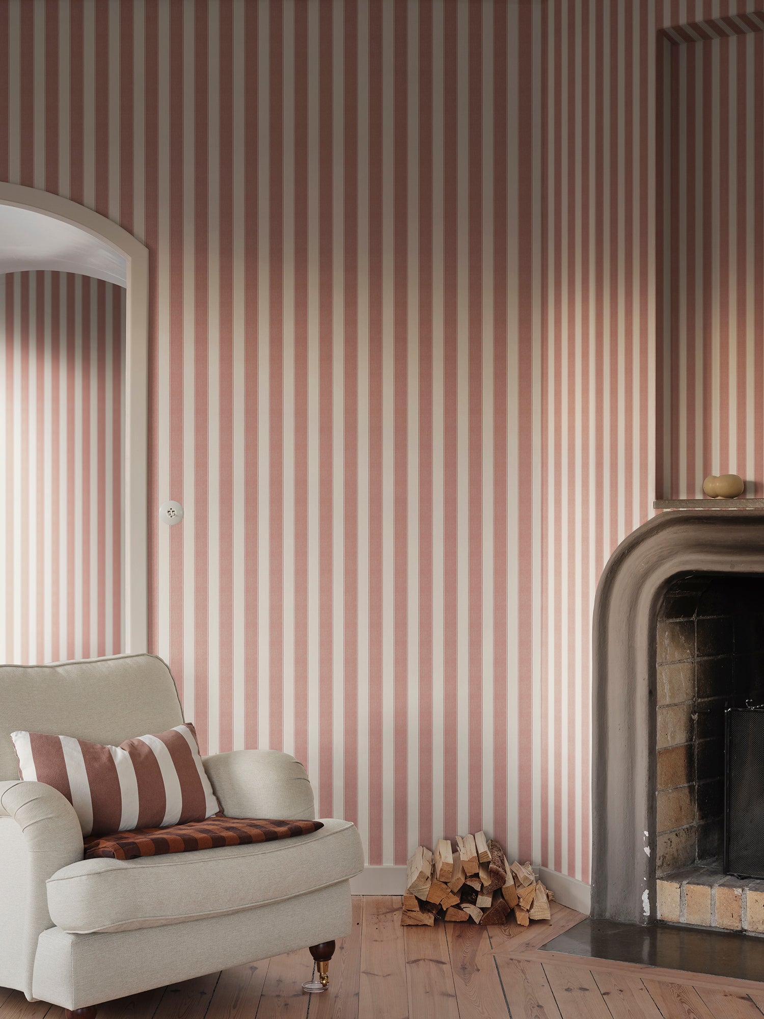 Henrik wallpaper by Sandberg in Red, styled on an interior wall