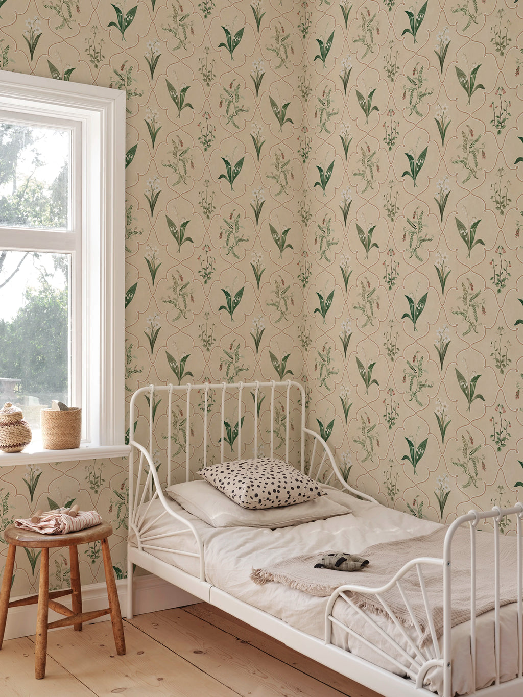Louise wallpaper by Sandberg – Green colourway, styled on an interior wall