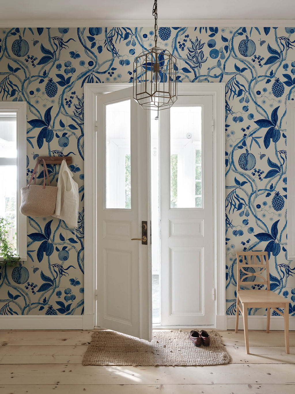Tree of Life Mural wall mural by Sandberg – Blue colourway, styled on an interior wall
