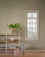 Jonas wallpaper by Sandberg in Garden Green, styled on an interior wall
