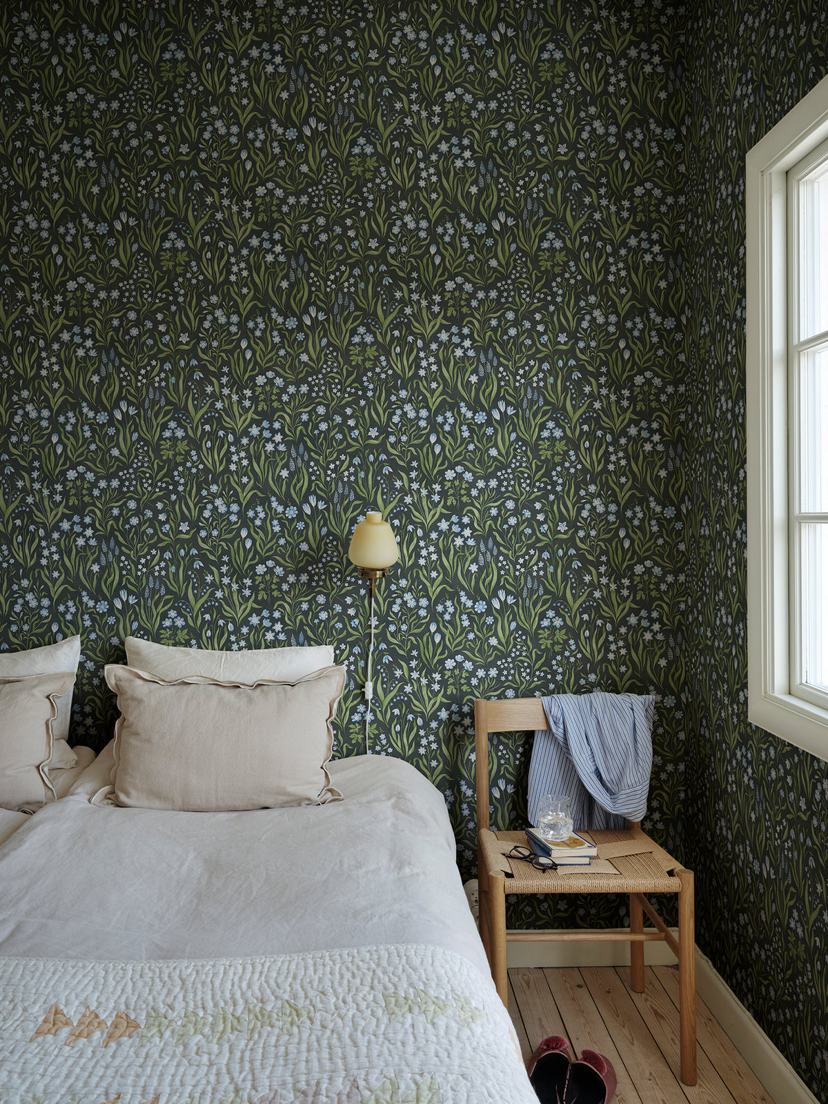 Märta wallpaper by Sandberg in Charcoal, styled on an interior wall