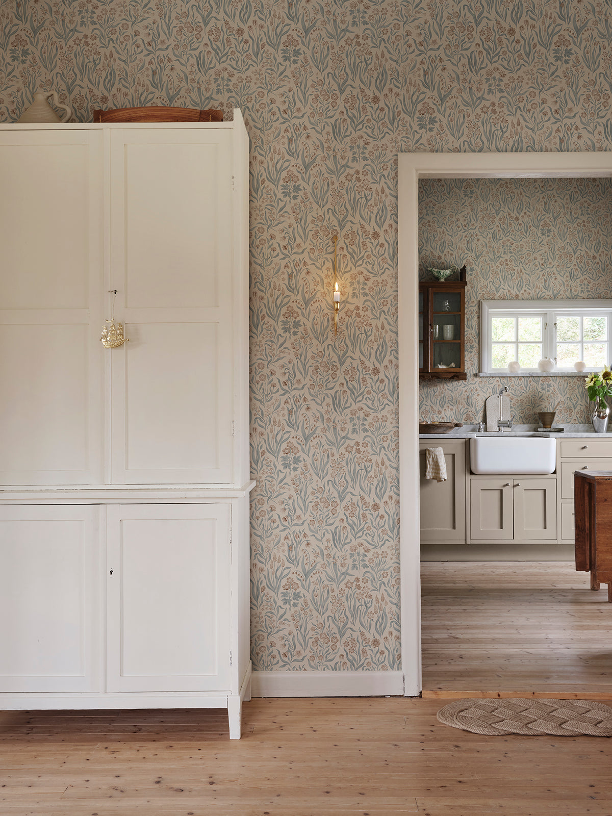 Märta wallpaper by Sandberg in Misty Blue, styled on an interior wall