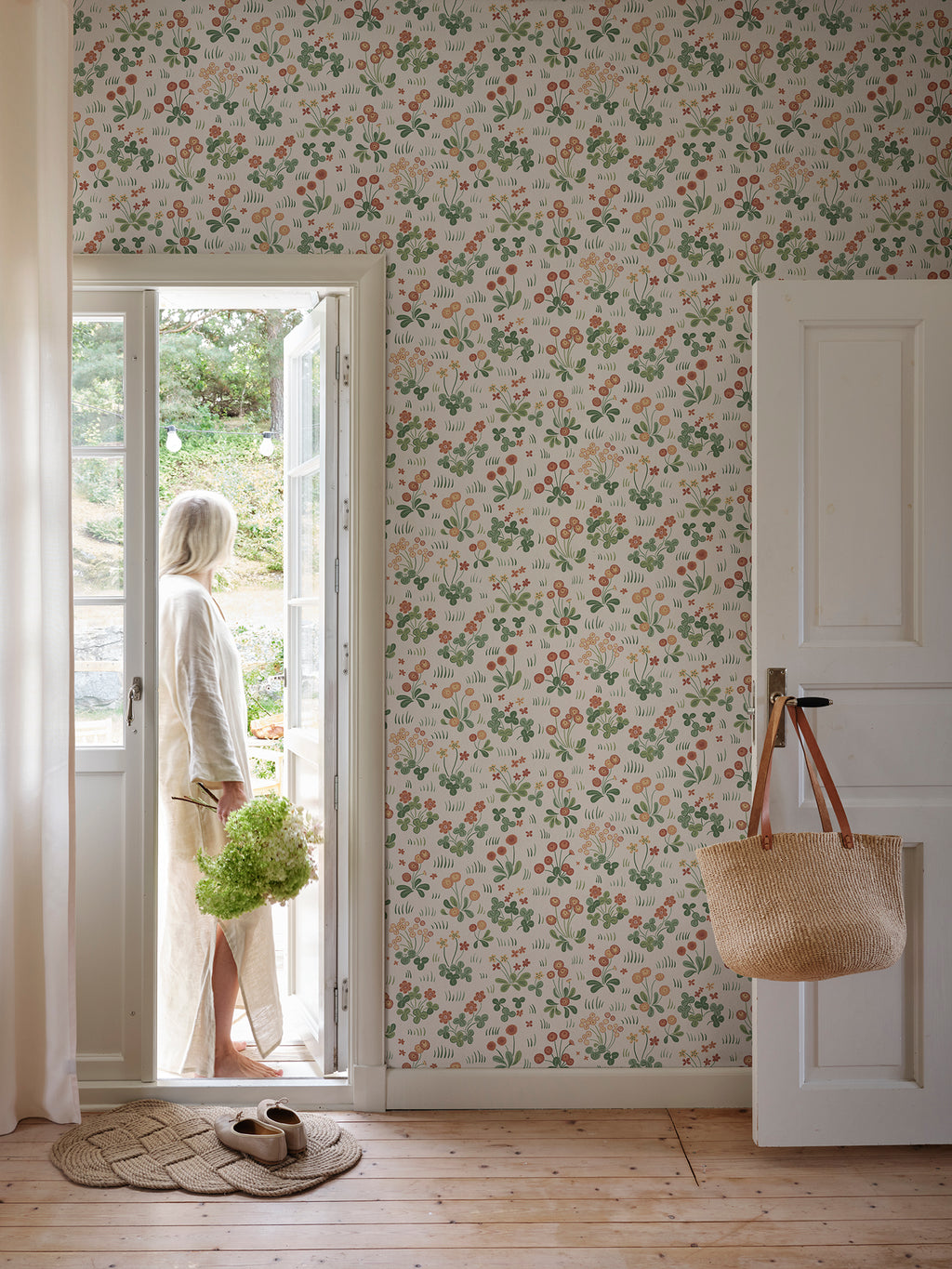 Bellis wallpaper by Sandberg in Red, styled in a room, view 2