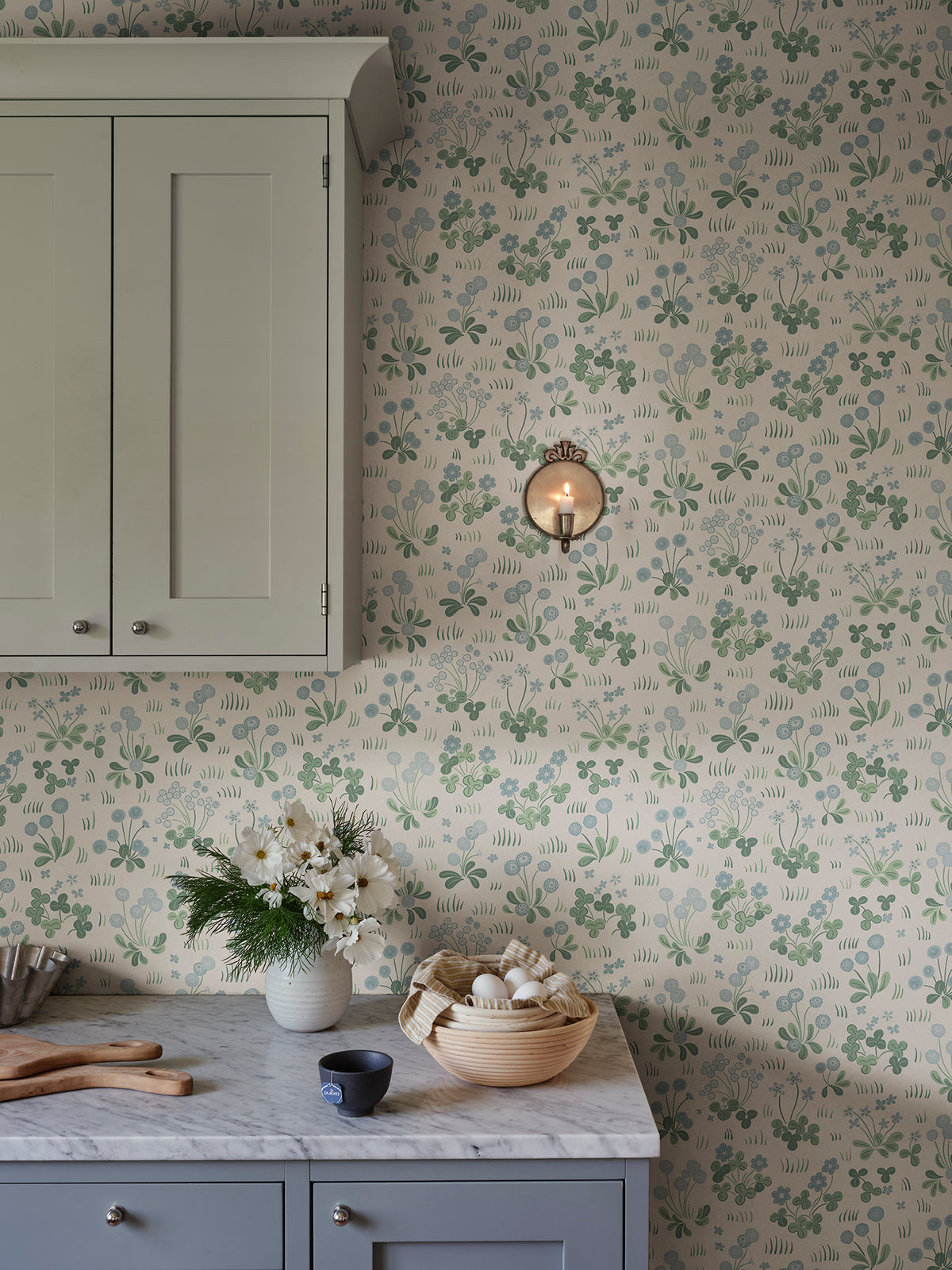 Bellis wallpaper by Sandberg in Misty Blue, styled in a room, view 2
