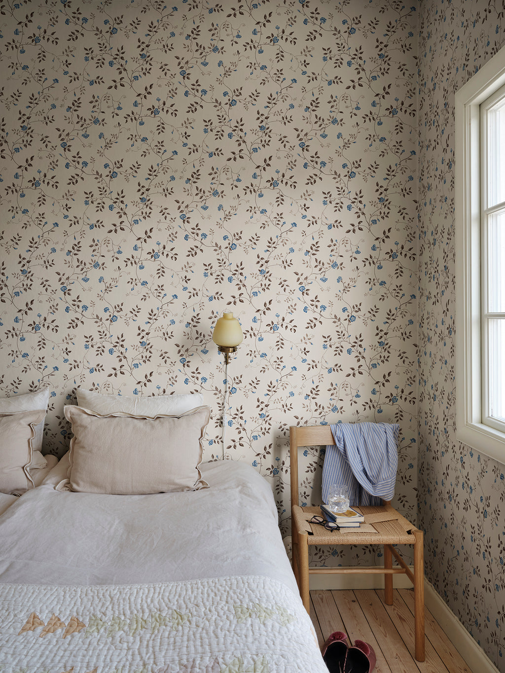 Henny wallpaper by Sandberg in Oat, styled on an interior wall