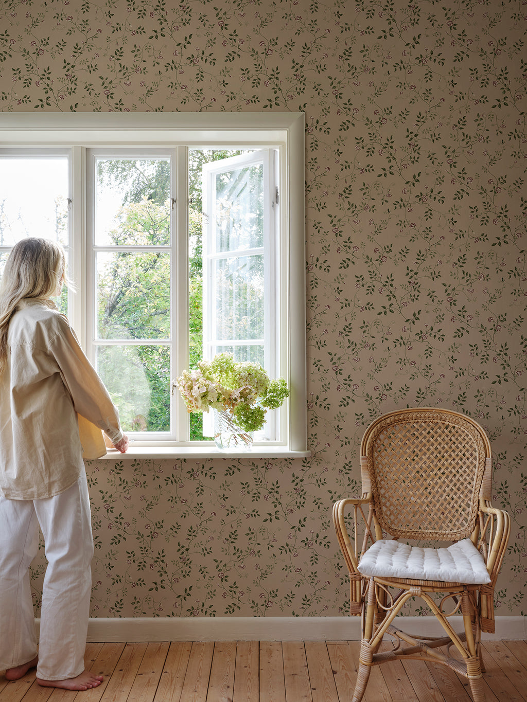 Henny wallpaper by Sandberg in Beige, styled on an interior wall