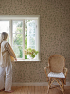 Henny wallpaper by Sandberg in Beige, styled on an interior wall