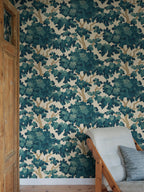 Eken wallpaper by Sandberg in teal-petrol green, styled beside a timber door with a linen armchair in the corner