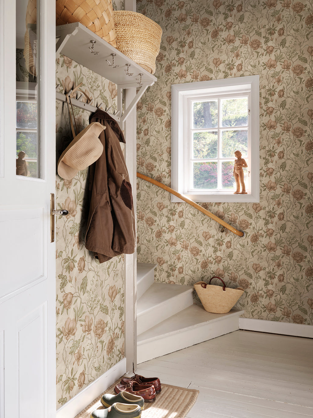 Linda wallpaper by Sandberg in Blush, styled on an interior wall