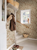 Linda wallpaper by Sandberg in Blush, styled on an interior wall