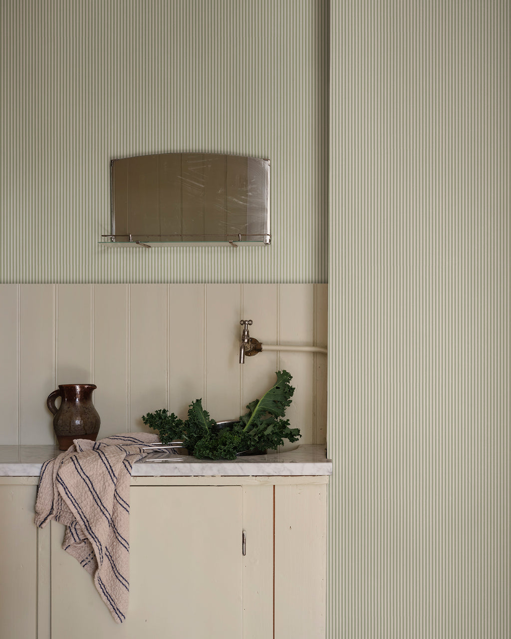 Fabian wallpaper by Sandberg in Garden Green, styled in a room, view 2