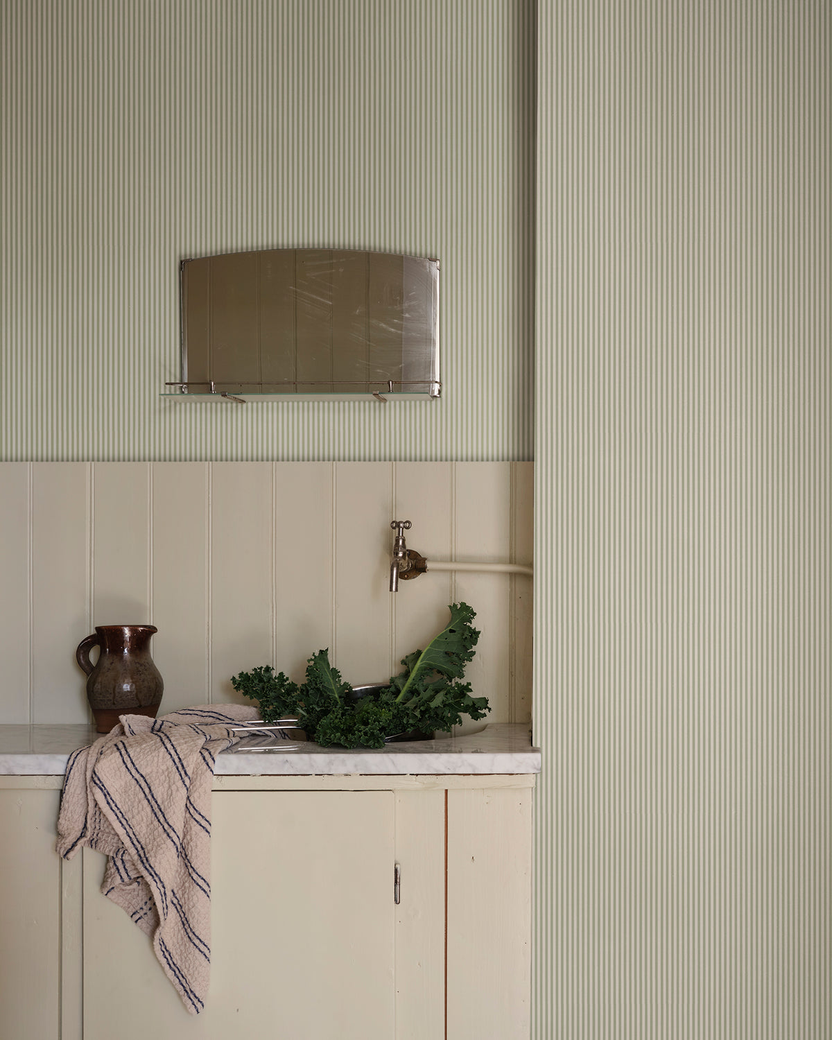 Fabian wallpaper by Sandberg in Garden Green, styled in a room, view 2