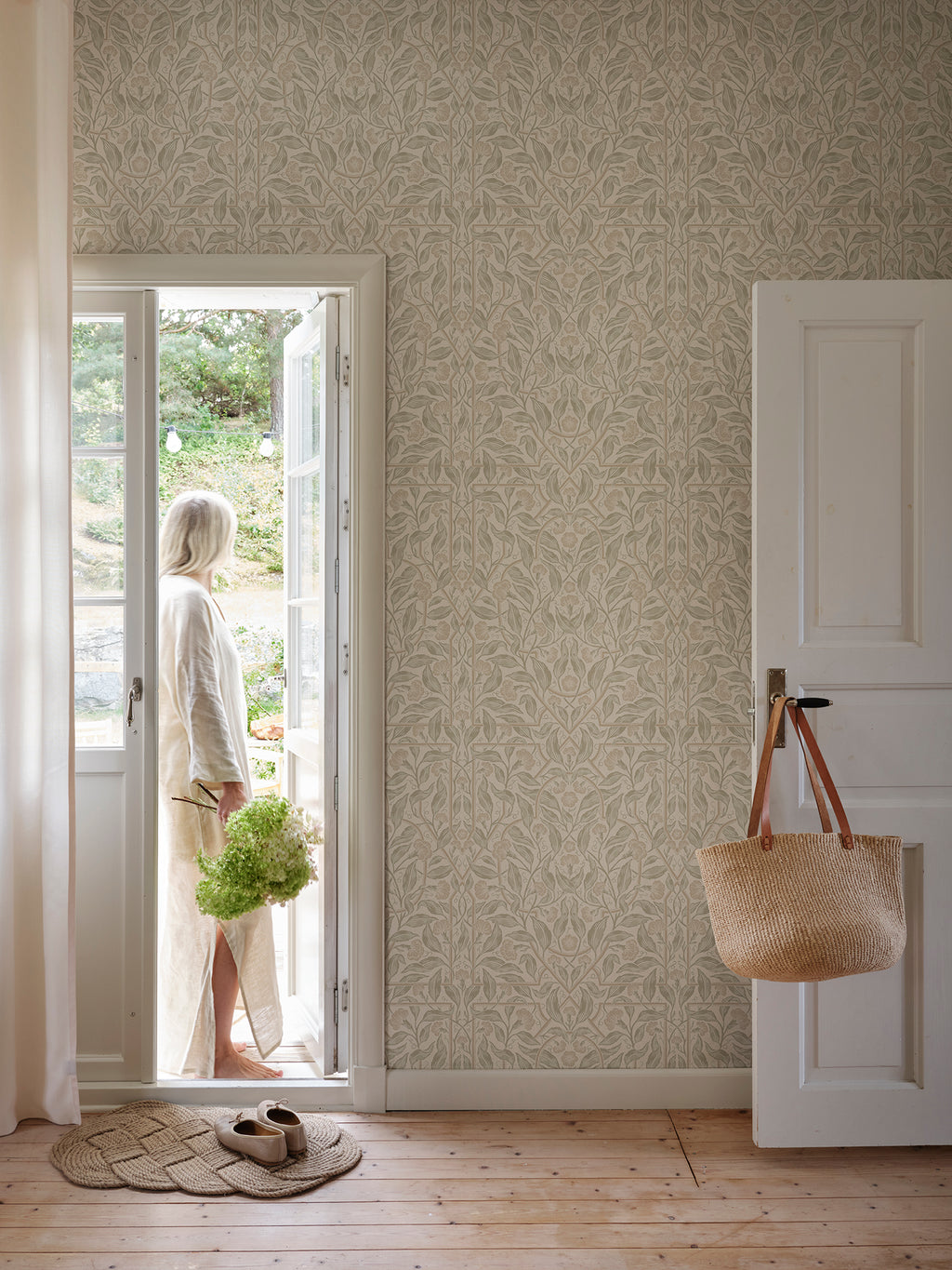 Edda wallpaper by Sandberg in Sandstone, styled on an interior wall