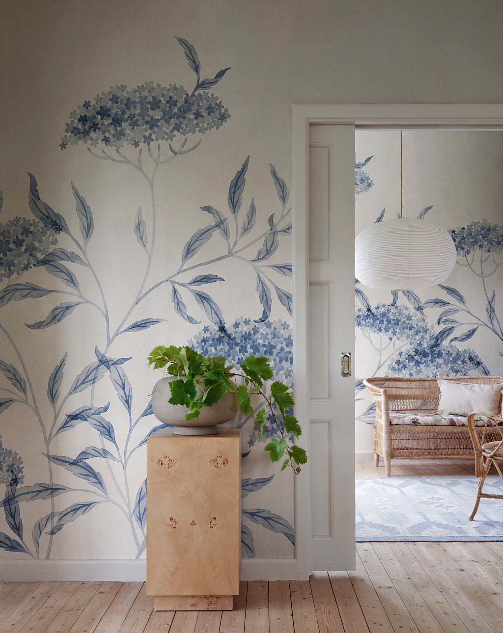Emmalisa wall mural by Sandberg in Blue, styled in a room, view 2