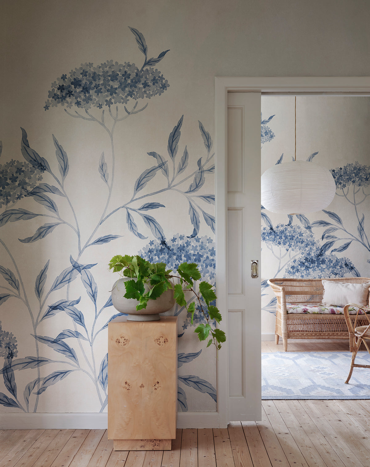 Emmalisa wall mural by Sandberg in Blue, styled in a room, view 2