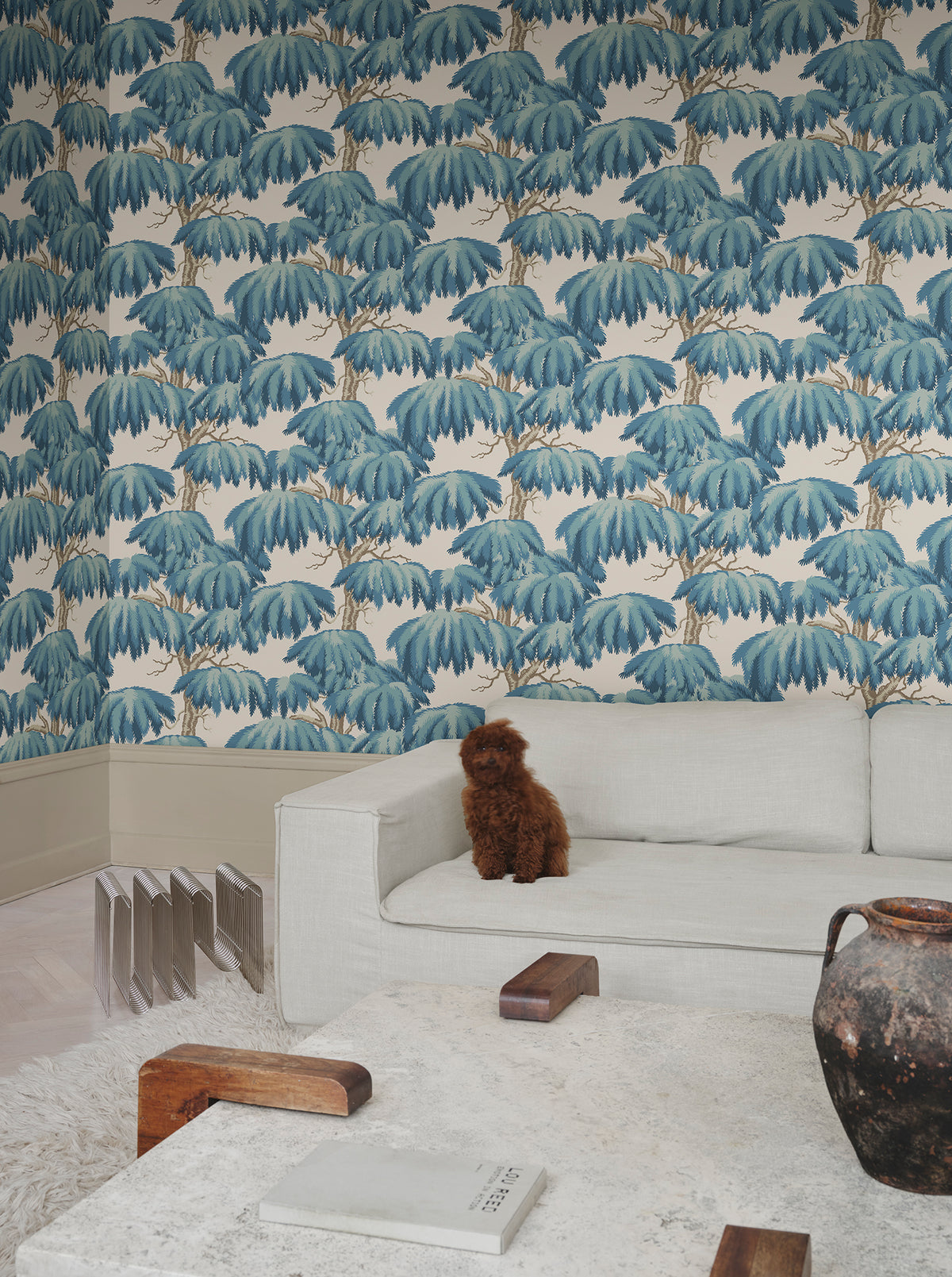 Alba wallpaper by Sandberg in Teal, styled on an interior wall
