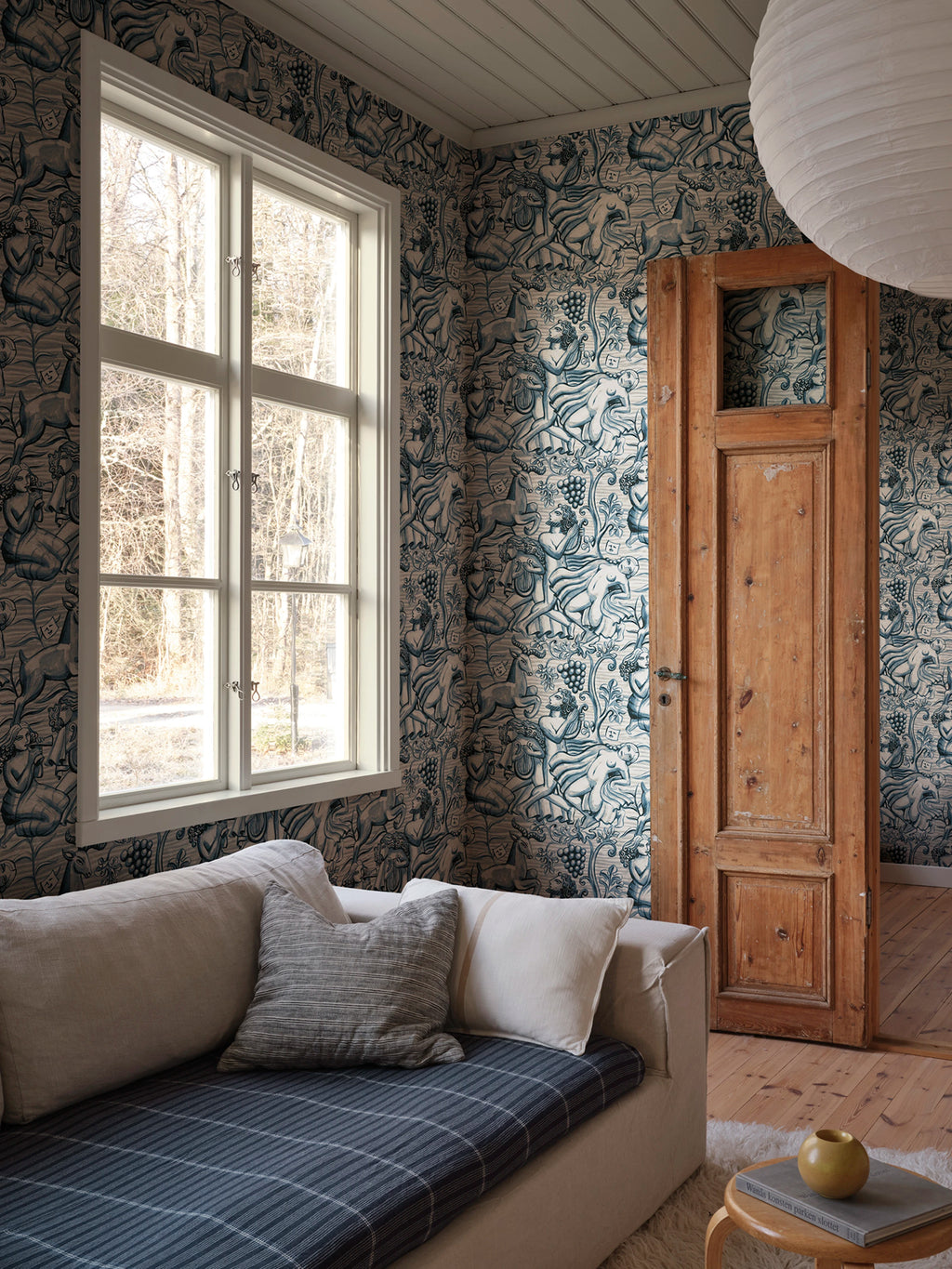Baccus wallpaper by Sandberg – monochrome design, Blue – styled in a room setting