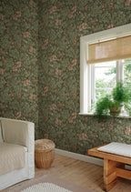 Tyra wallpaper by Sandberg in Forest Green, styled on an interior wall